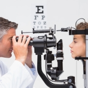 Optometrist giving an eye exam
